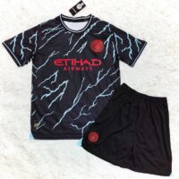 Bộ quần clb mc manchester man city 2023 mẫu thứ 3 xanh chuối hoạ tiết đen logo thêu gai thái 1