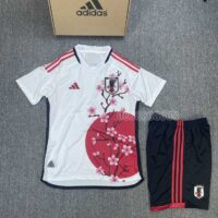 Áo bóng đá đội tuyển nhật bản japan trắng vai in lá cờ hoa anh đào quần đen vải caro thái mặt trước