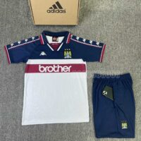 Bộ quần áo bóng đá MC Manchester Man City 1997 1998 sân khách Brother Kappa trắng xanh than mặt trước