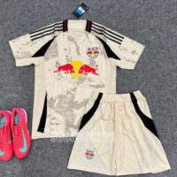 Bộ quần áo bóng đá Redbull vàng be cổ tròn mới logo thêu vải sợi mè màu vàng be mặt trước