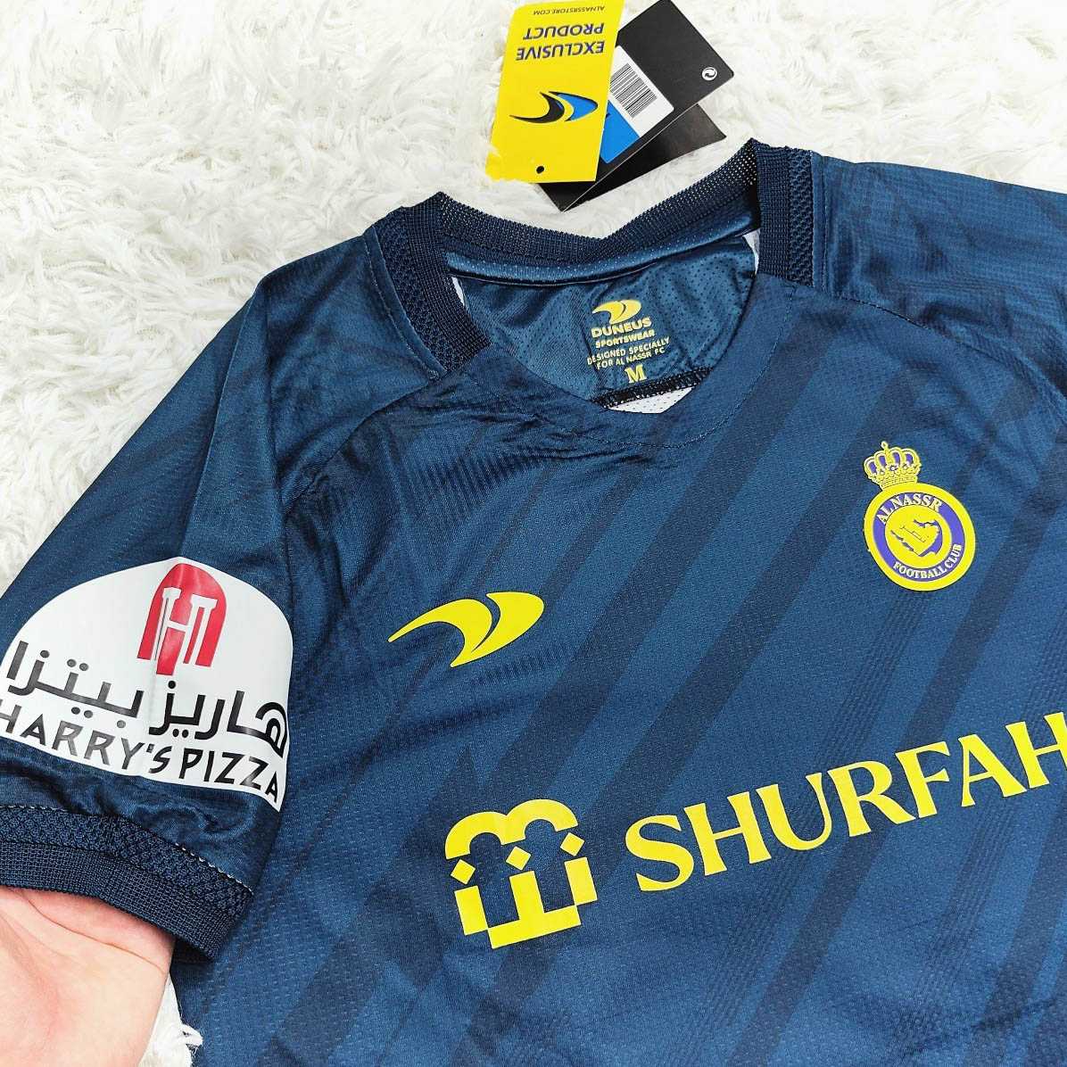 Bộ quần áo đá banh clb bóng đá AL Nassr Shurfah mới Ronaldo sân nhà màu vàng be nhạt xanh than logo vải thái mới 2023