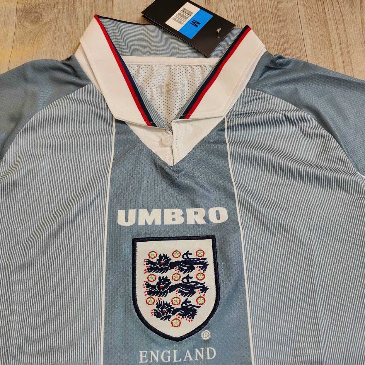 Bộ quần áo đá bóng đội tuyển anh enland umbro kỷ niệm năm 1998 màu trắng đỏ xám xanh quần có túi