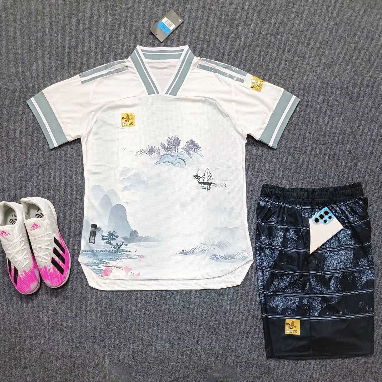 Bộ quần áo đá banh clb bóng đá Hoa Sen ba lá hoạ tiết Sơn Hà sông núi màu trắng quần có túi vải thái 1