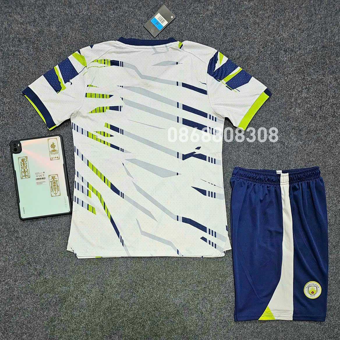 Bộ quần áo đá banh clb bóng đá Manchester Man City 23 24 bản đặc biệt màu trắng xanh lá quần than 2023 2024 logo thêu vải thái mặt trước