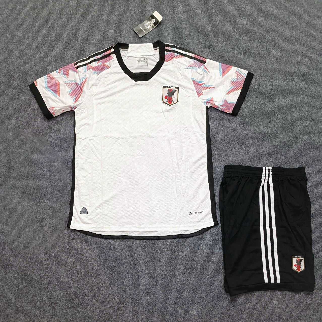Bộ quần áo polo đội tuyển nhật bản japan trắng vai hoạ tiết màu đỏ xanh cổ tròn logo thêu 2