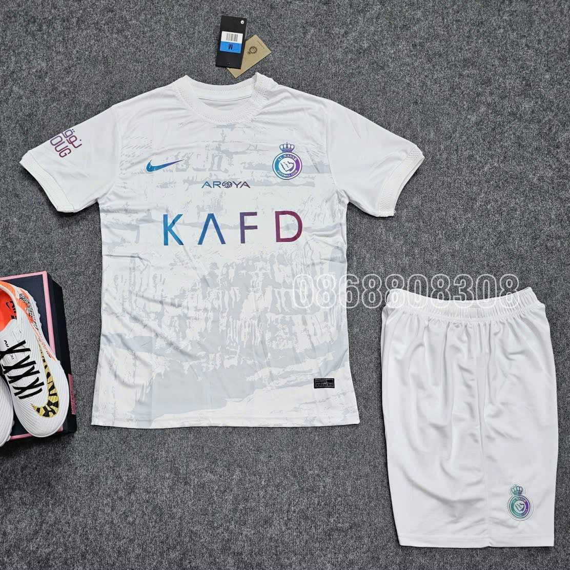 Bộ quần áo AL Nassr KAFD 23 24 Third Kit mẫu sân thứ 3 năm 2023 2024 màu trắng full logo vải thái mịn cổ tròn mặt trước