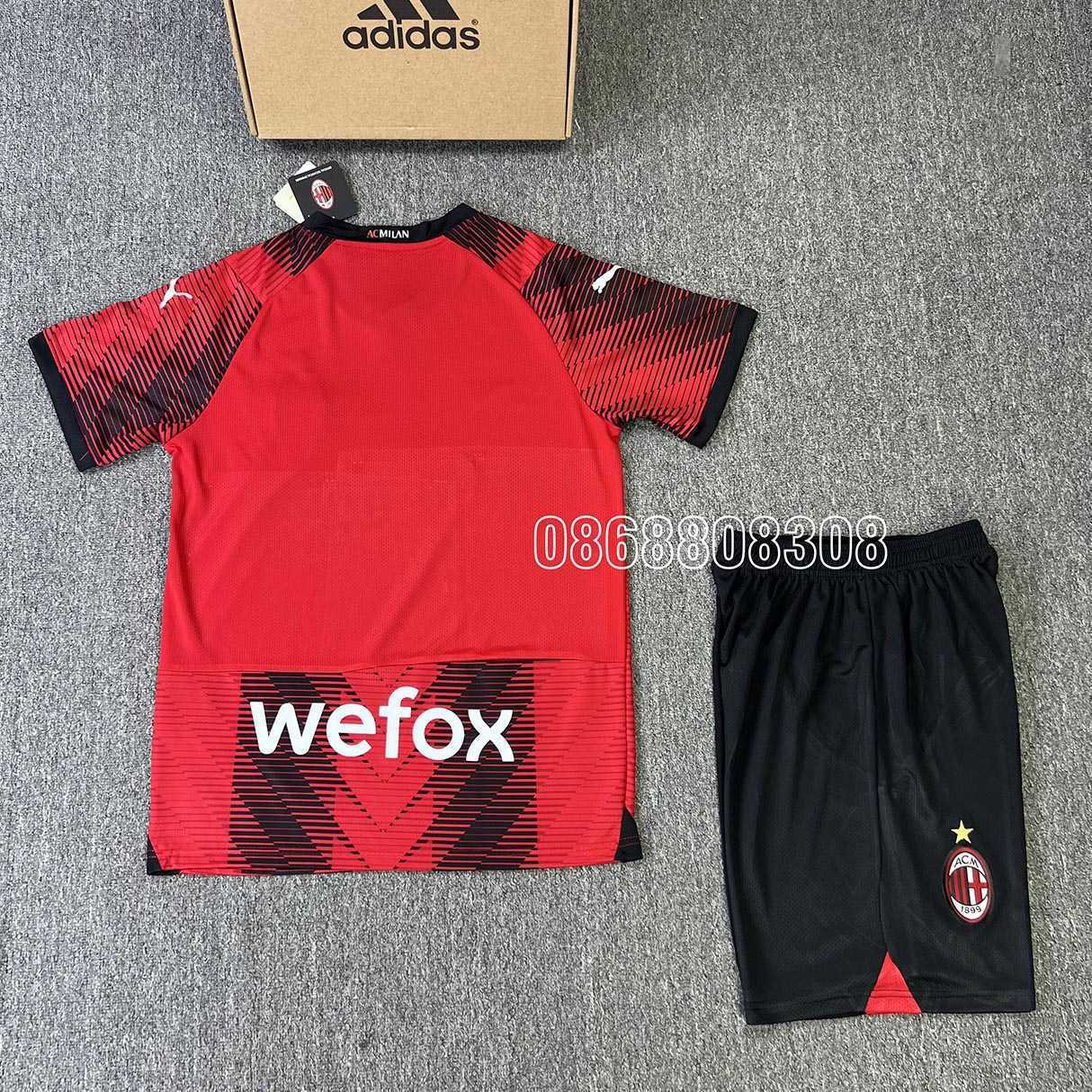 Bộ quần áo bóng đá ACM AC Milan Home 2324 mẫu sân nhà màu đỏ đen logo puma thêu vải SPF thái mới mùa năm 2023 2024 mặt trước