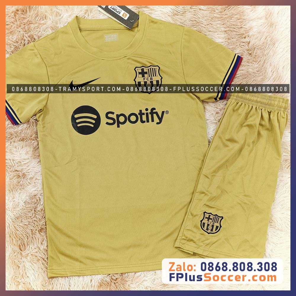 Bộ quần áo bóng đá bóng clb Barcelona màu vàng đậm nhạt logo thêu poly mè kim thái cao cấp 1